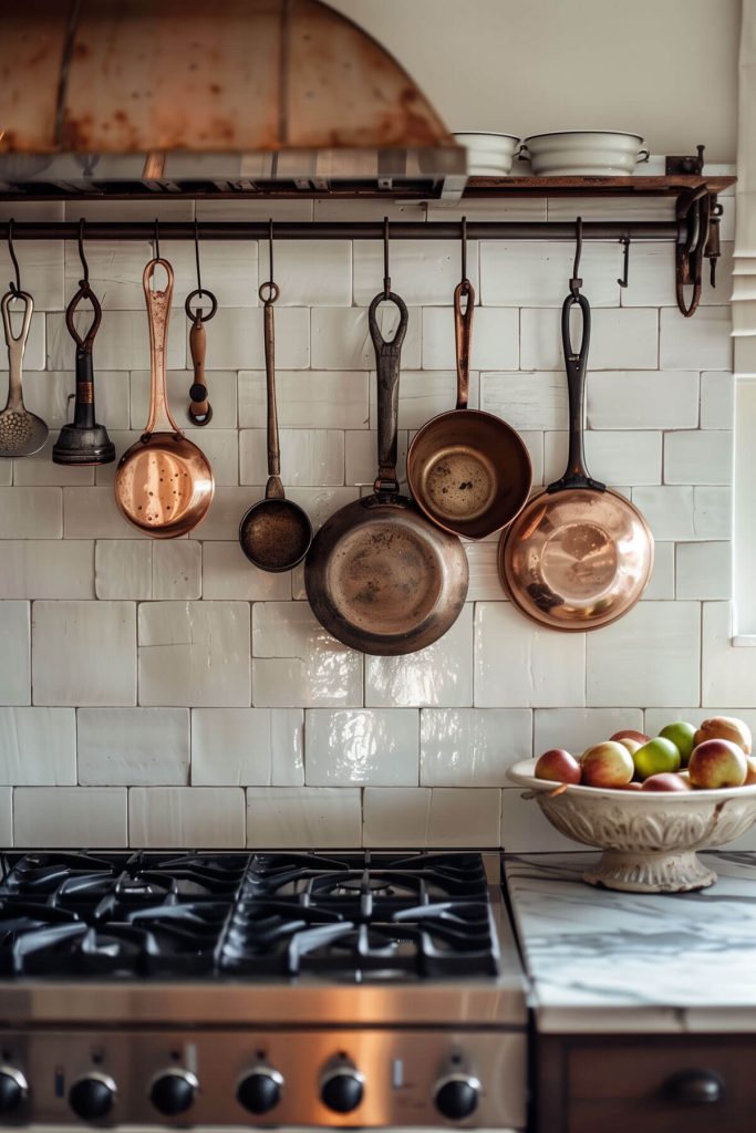 Sophisticated farmhouse kitchen with copper accents, from pots and pans to backsplashes, adding warmth.
