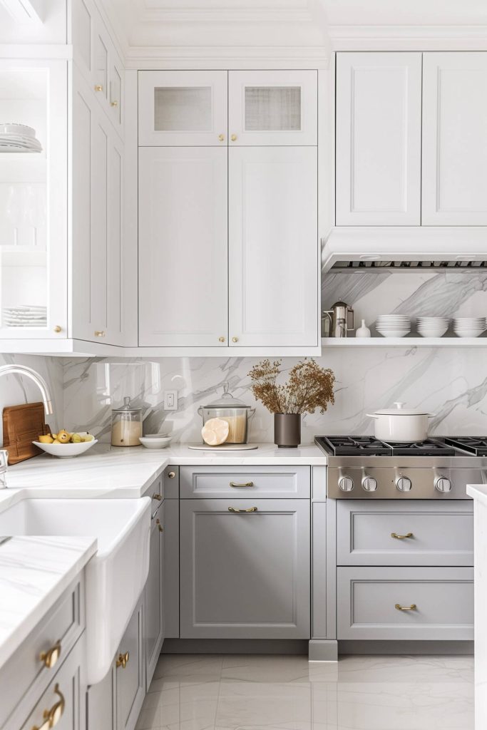 Dual-tone kitchen with upper white cabinets and lower grey cabinets for a modern look.
