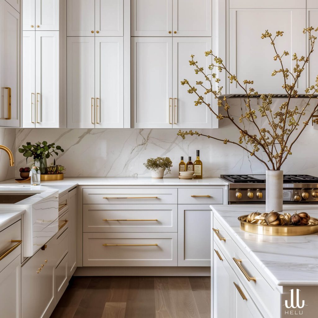 White kitchen cabinets with trendy brass channel pulls for a contemporary edge.