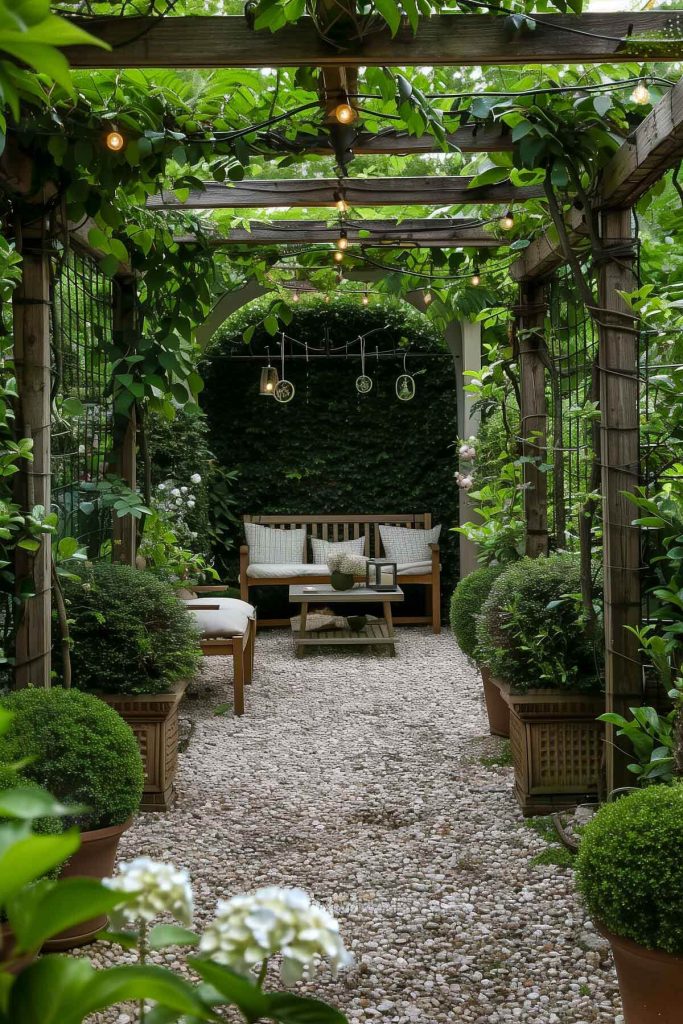 A hidden garden corner with dense planting, a trellis entrance, and seating.