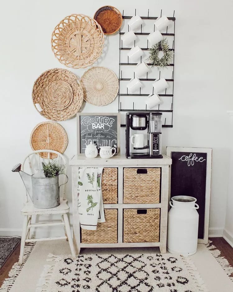 Cozy farmhouse coffee bar with woven basket decor, rustic elements, and a sturdy cabinet housing coffee essentials.