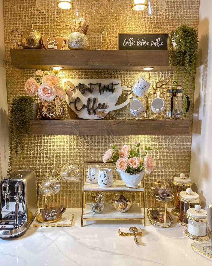 Elegant coffee corner with wood and brass accents, wall-mounted shelves, and greenery.