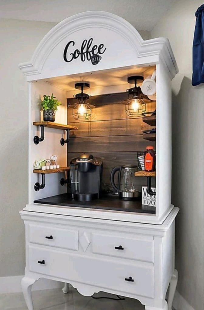 Vintage cabinet coffee nook with rustic and modern elements, cozy lighting, and open shelves.