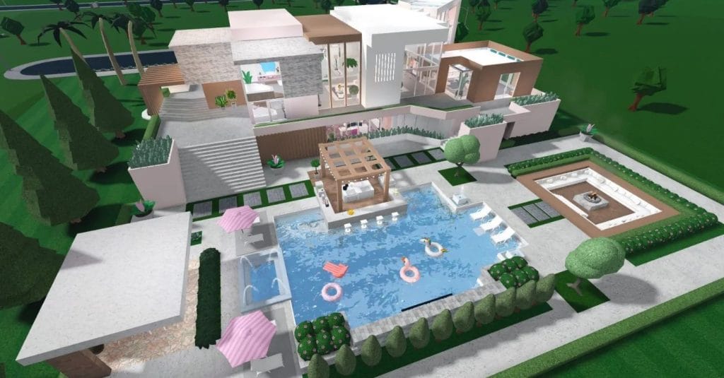 A stylish modern mansion with a soft pink exterior, contemporary design elements, and beautiful outdoor spaces.