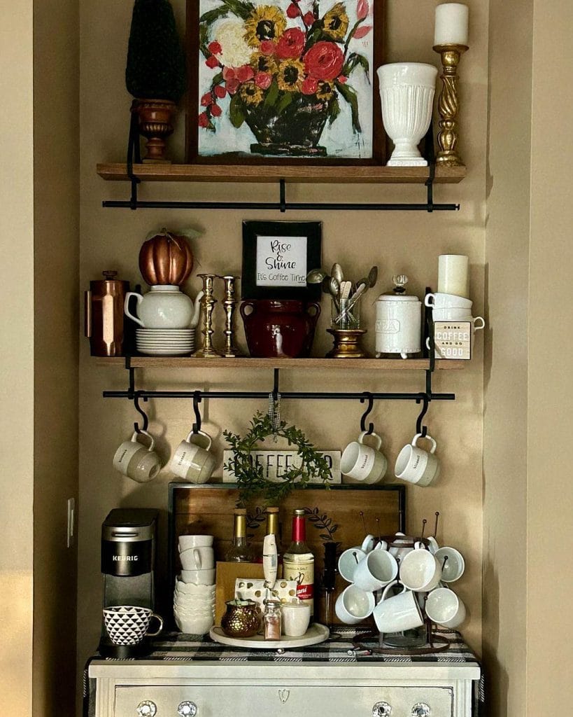 A rustic wooden hutch coffee bar adorned with vintage decor items, a coffee machine, and hanging mugs. Natural wood tones and antique accessories create a warm, inviting atmosphere.