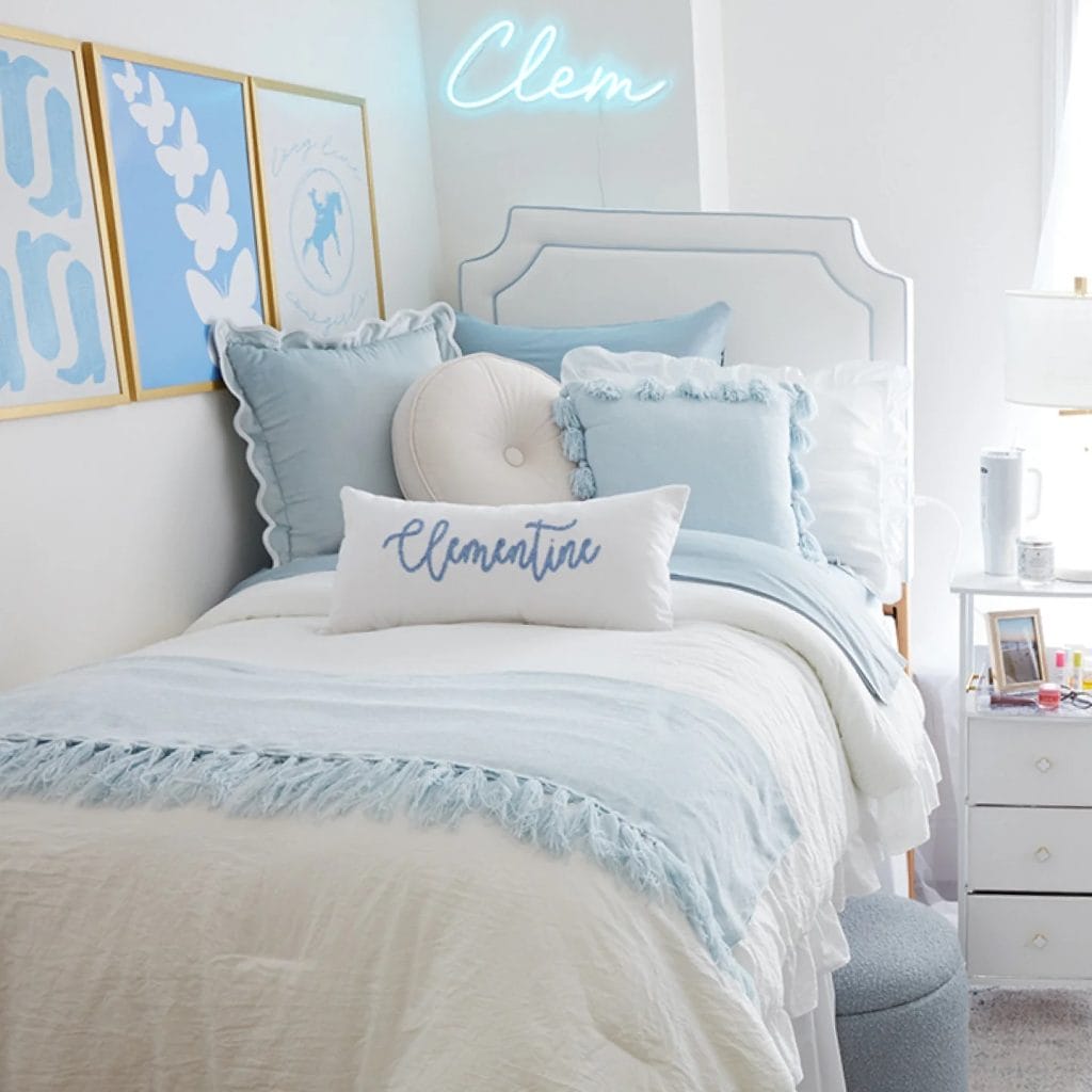 Blue and white retreat with personalized decor, neon signs, and custom pillows.