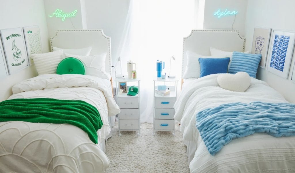 Room with personalized neon signs, vibrant green and blue decor, and matching bedding.