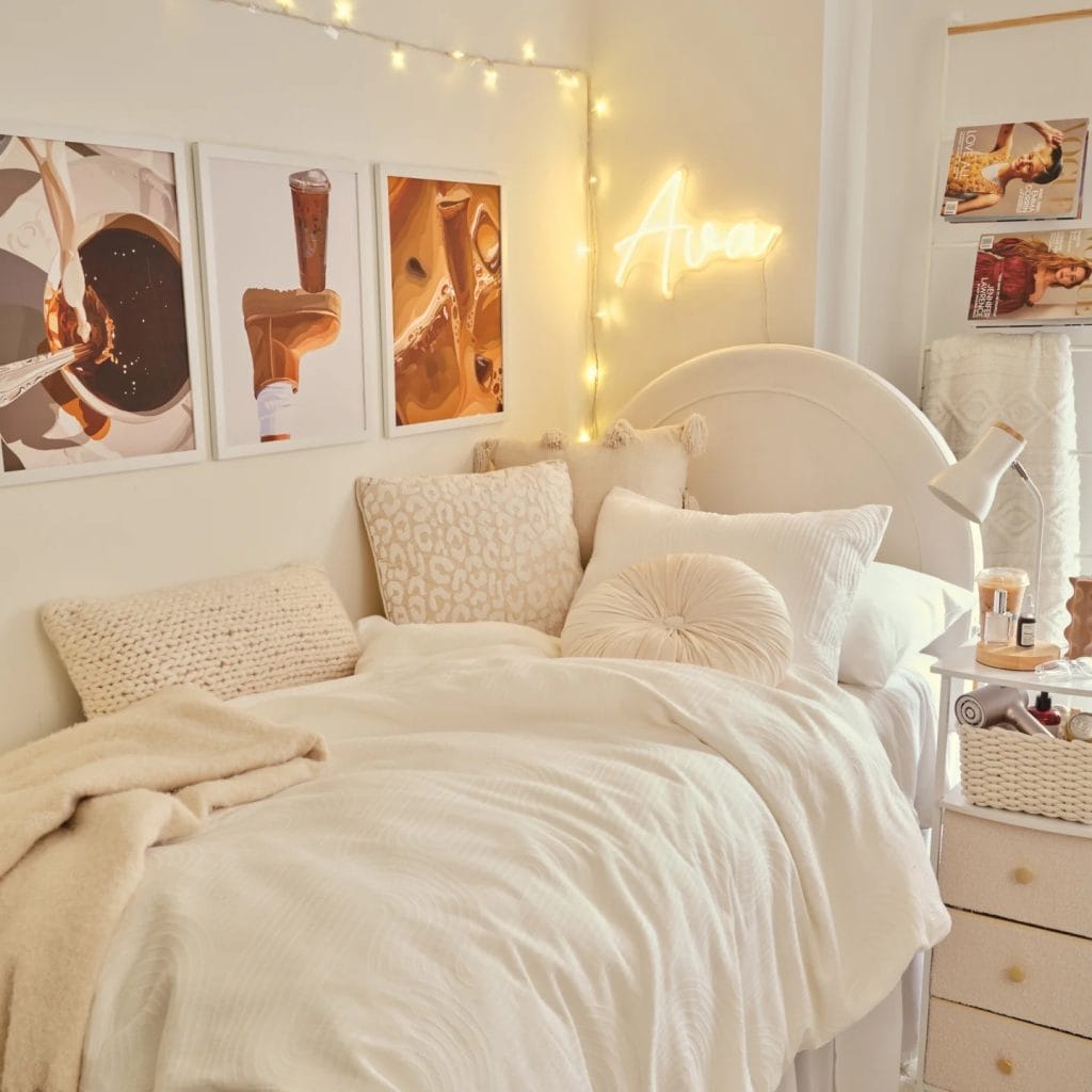 A serene room with neutral bedding, a personalized neon sign, and string lights creating a cozy atmosphere.