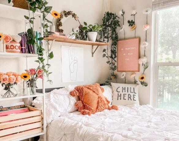 Bohemian-inspired bedroom with greenery, cozy throws, and personal decor.