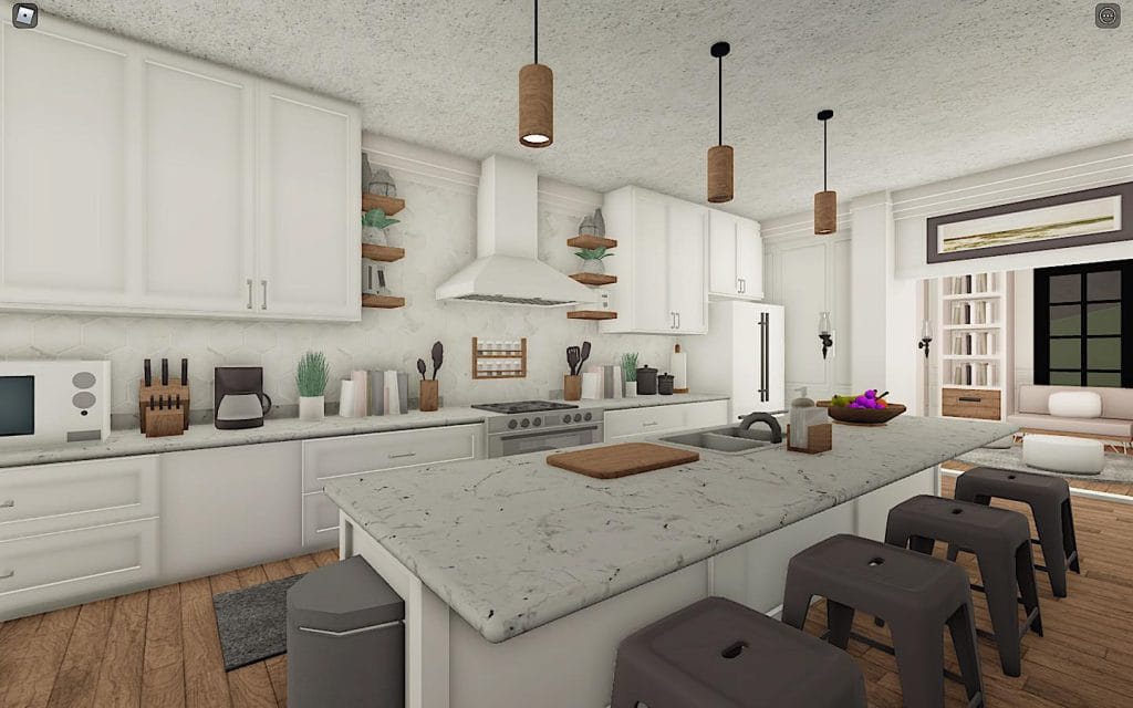 A modern Bloxburg kitchen with white cabinetry, marble countertops, and wood accents.