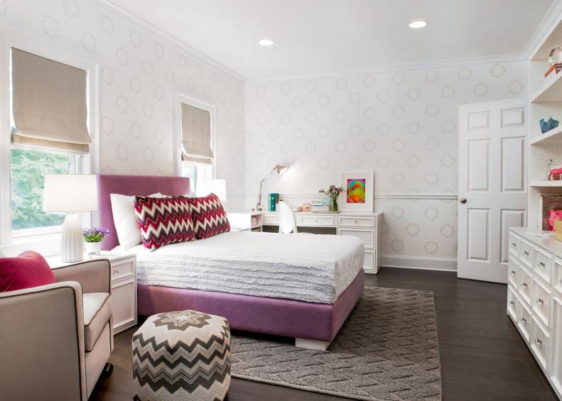 Modern teen bedroom with pastel decor, chevron patterns, and sleek furniture.