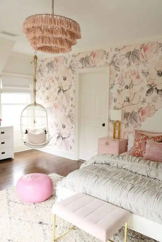 Bedroom with floral wallpaper and hanging swing chair.