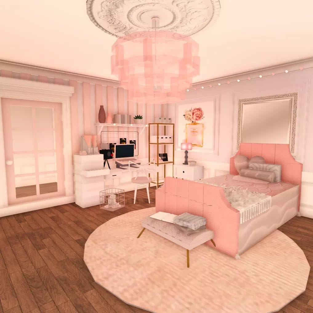 A luxury teen bedroom with pink decor, plush bed, sleek workstation, and sophisticated elements.