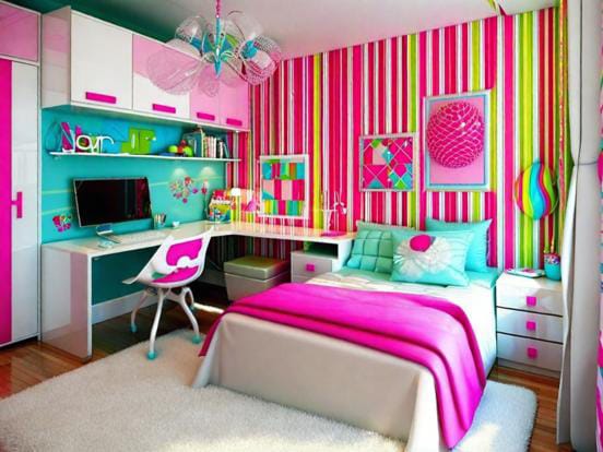 A bedroom with bright striped walls in pink, green, and yellow, featuring matching furniture and decor.