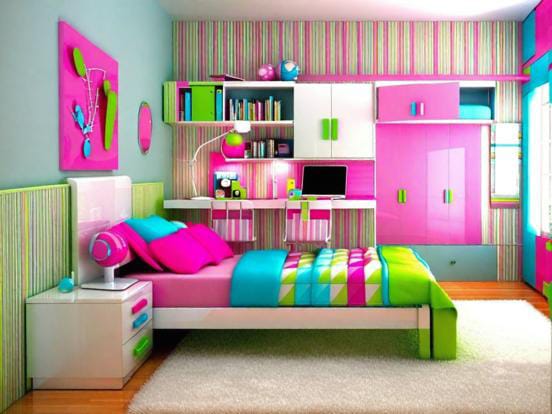 A modern bedroom with a vibrant pink color scheme, featuring clean-lined furniture and colorful bedding.