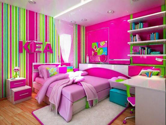 A bedroom with pink and green tones, featuring striped decor and a fun, playful atmosphere.