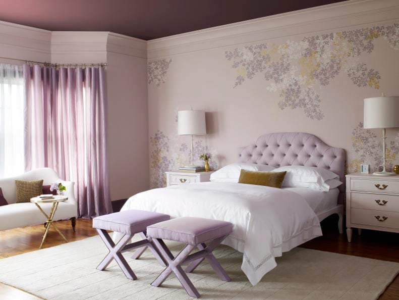 Soft and serene teen bedroom with lavender accents, tufted headboard, and floral wallpaper.