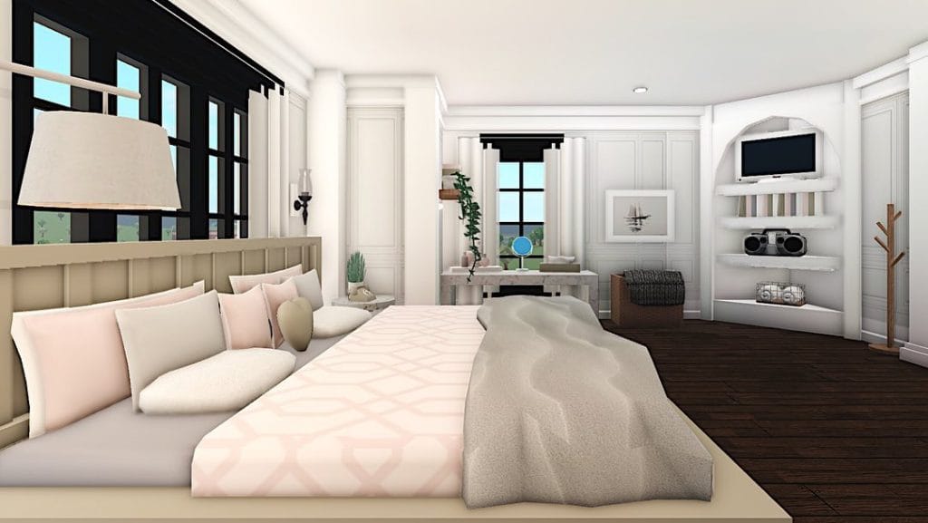 An elegant bedroom with a large bed, plush pillows, soft neutral tones, and a spacious layout in a hillside mansion.