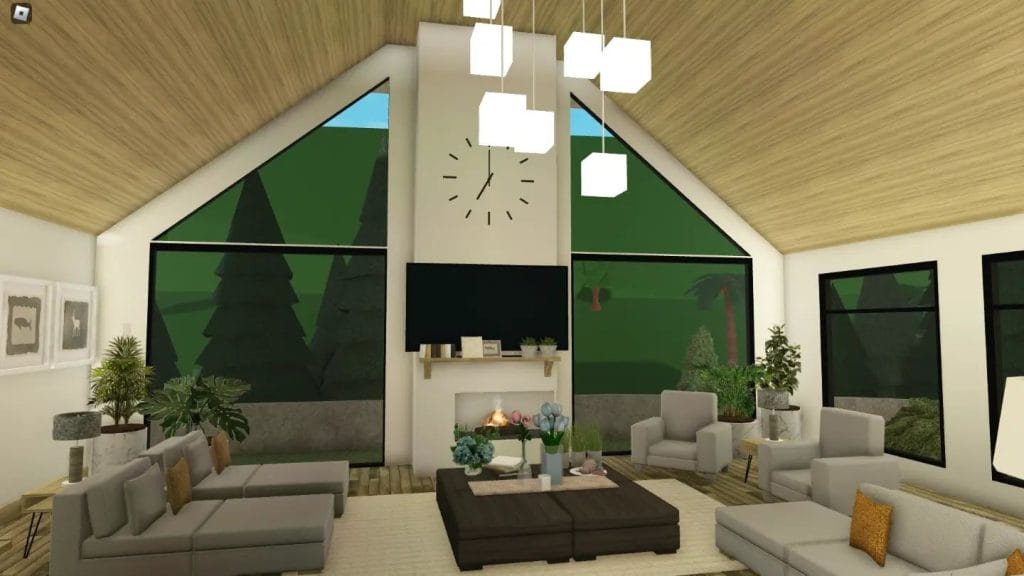 Modern tropical Bloxburg living room with high ceilings, large windows, and hillside views.