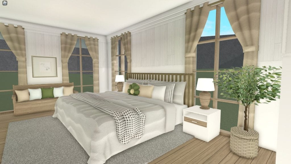 A coastal-themed bedroom with soft beige and white tones, a spacious bed, large windows, and beach-inspired decor.