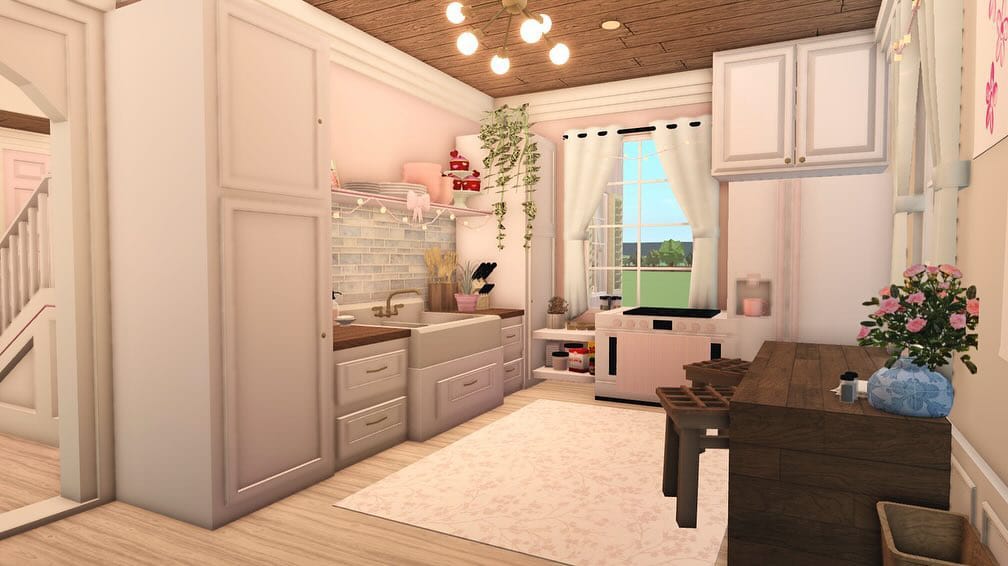 A cozy Bloxburg kitchen with pastel colors, rustic wooden ceiling, and inviting decor.