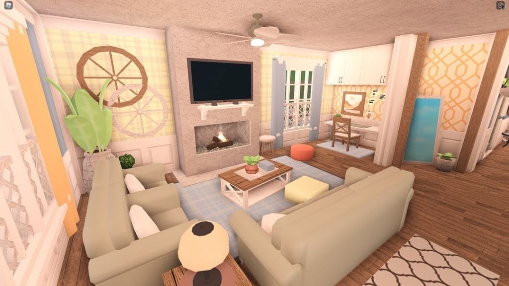 Coastal Bloxburg living room with white furnishings, large windows, and natural textures.