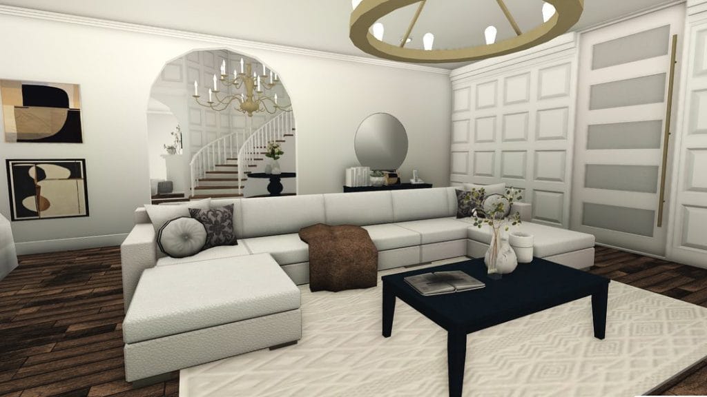 Elegant living room with modern sectional sofa and chandelier.