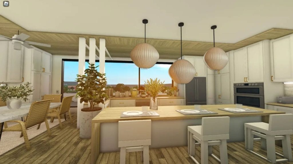 Modern kitchen with large pendant lights, natural wood accents, and indoor plants.