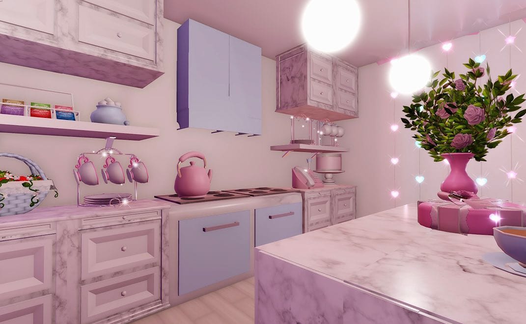 Pastel pink and lavender kitchen with soft lighting and whimsical decor.