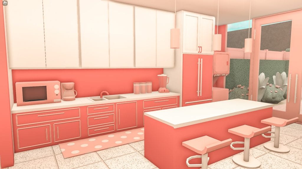 Bright pink kitchen with playful decor, reminiscent of a Barbie Dream House.