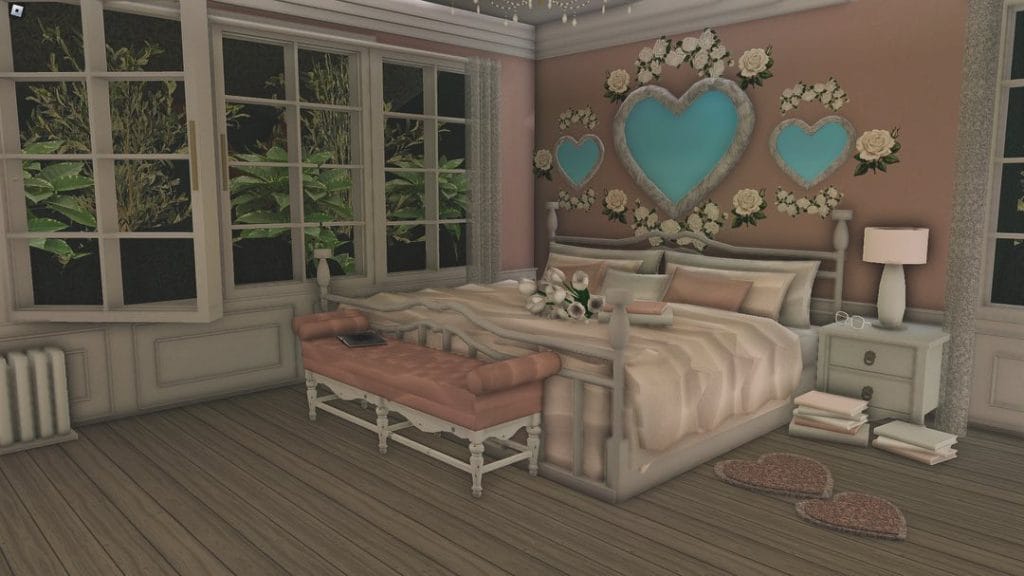 A romantic bedroom with heart-shaped wall decor and a plush bench.