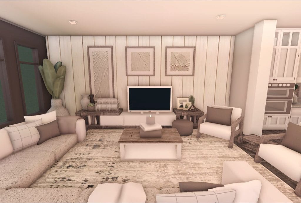 Cozy modern living room with a neutral color palette, minimalist decor, and comfortable seating.