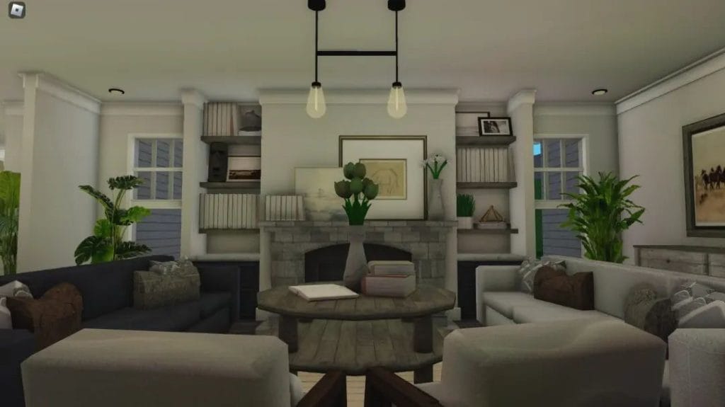 Cozy living room with a stone fireplace, green accents, and built-in shelves.