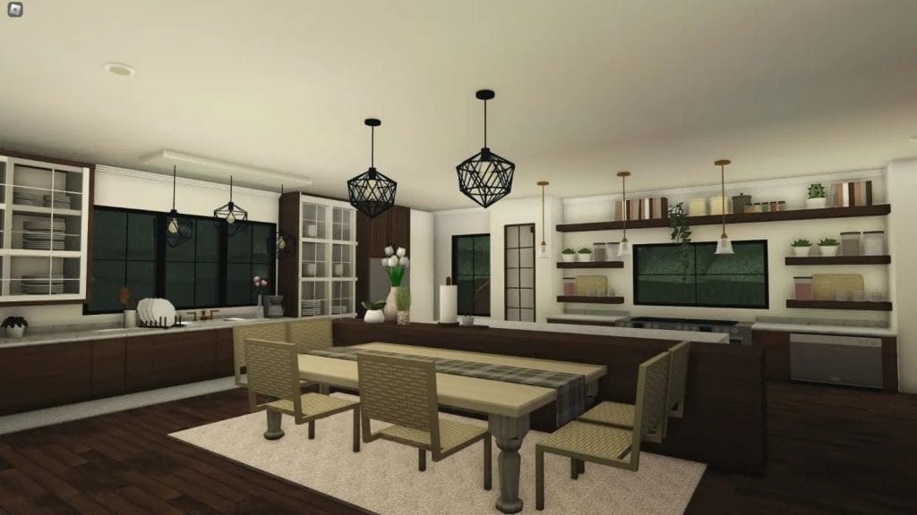 Modern family farmhouse kitchen with a large island and elegant lighting.