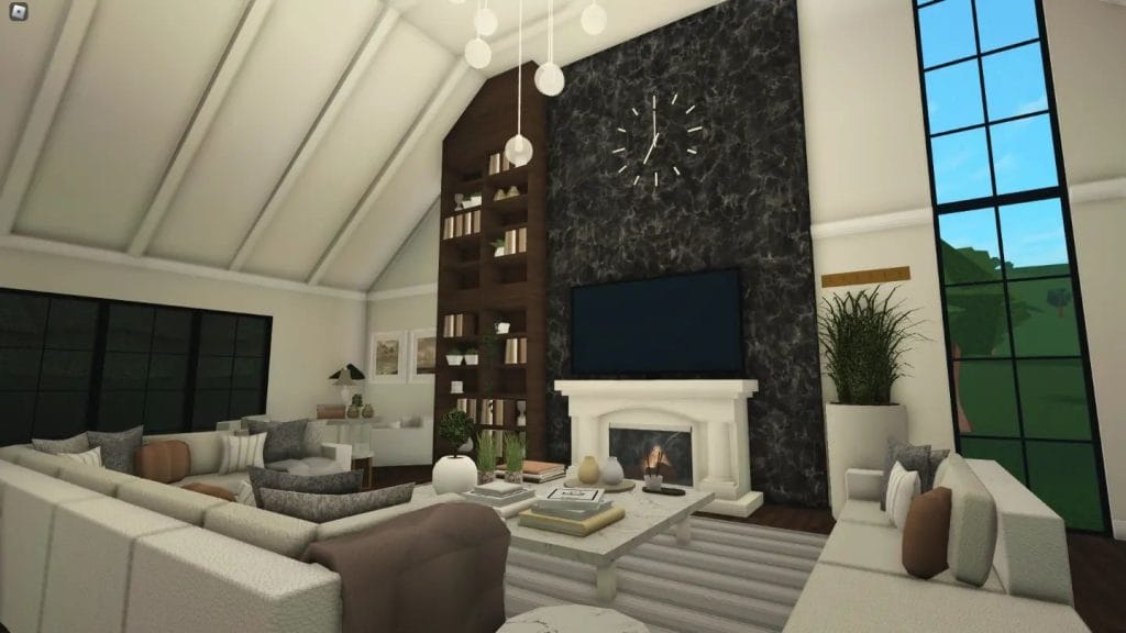 Spacious living room with vaulted ceilings, stone accent wall, and central fireplace.