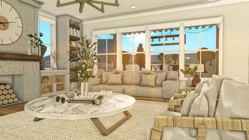 Cozy farmhouse suburban home living room with neutral tones, large windows, and wooden beams.