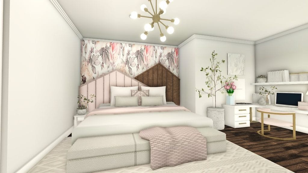 A luxury suburban mansion bedroom with a floral accent wall, modern chandelier, and a cozy seating area.