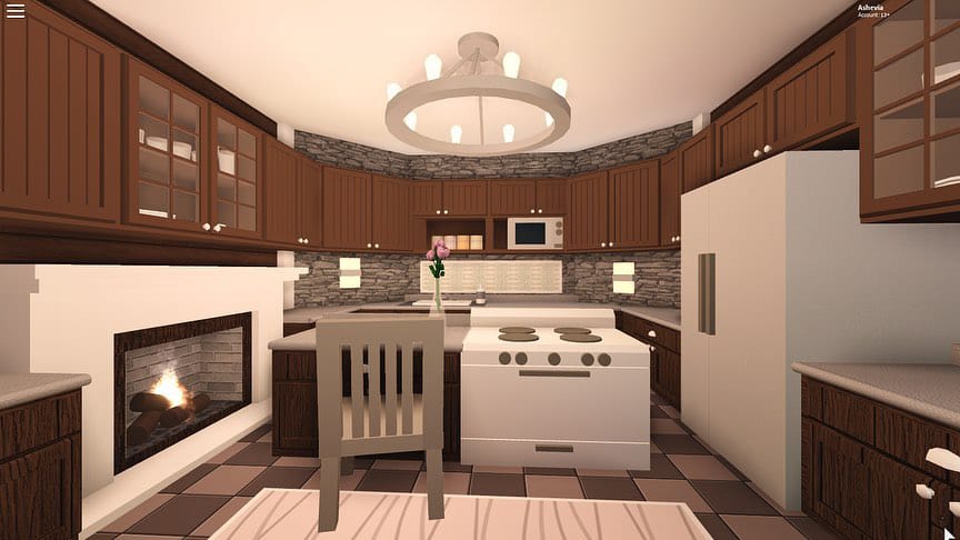 Hillside family home kitchen with warm wood tones and a stone accent wall.