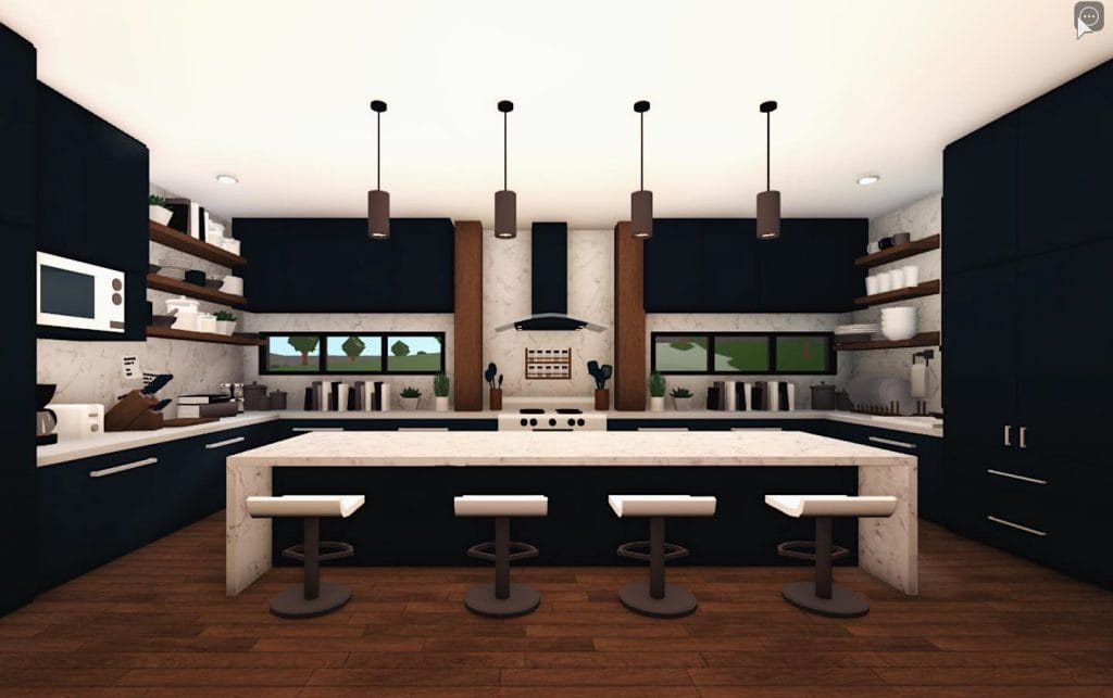 Modern family home kitchen with a large island and open shelving.