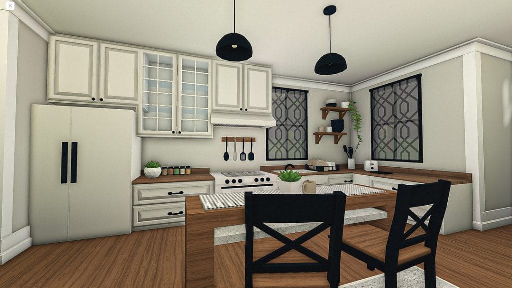 Modern family farmhouse kitchen with clean lines, wood accents, and black pendant lights.