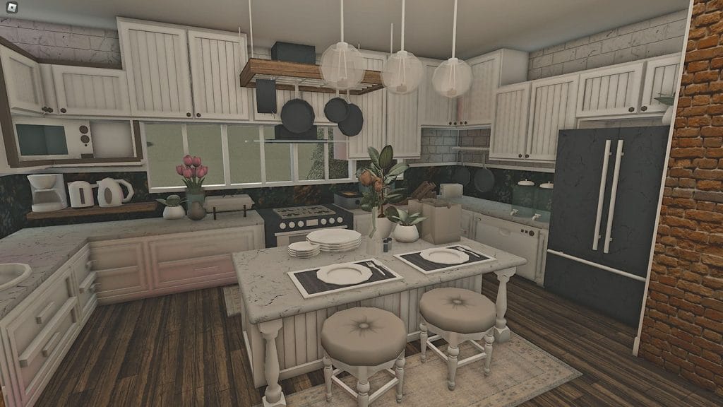 A family kitchen with white cabinets, stainless steel appliances, and a large island in a spacious layout.