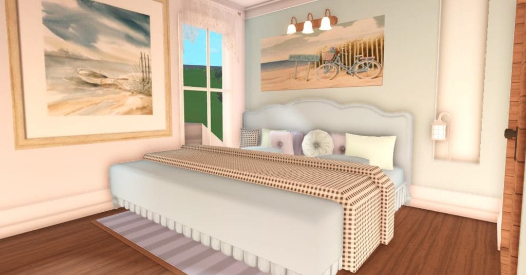 Beach-themed bedroom with ocean paintings and pastel tones.