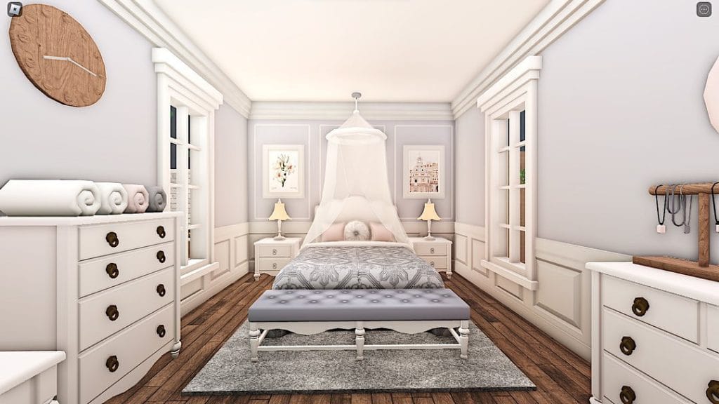 Small bedroom with soft colors and smart storage.