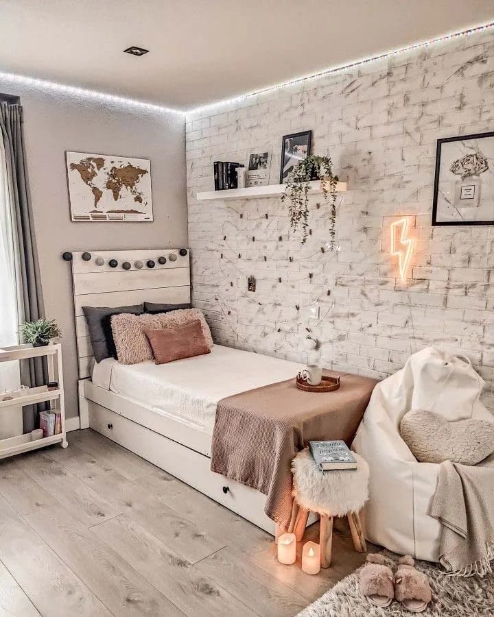 Modern dorm room with minimalist decor and cozy lighting.