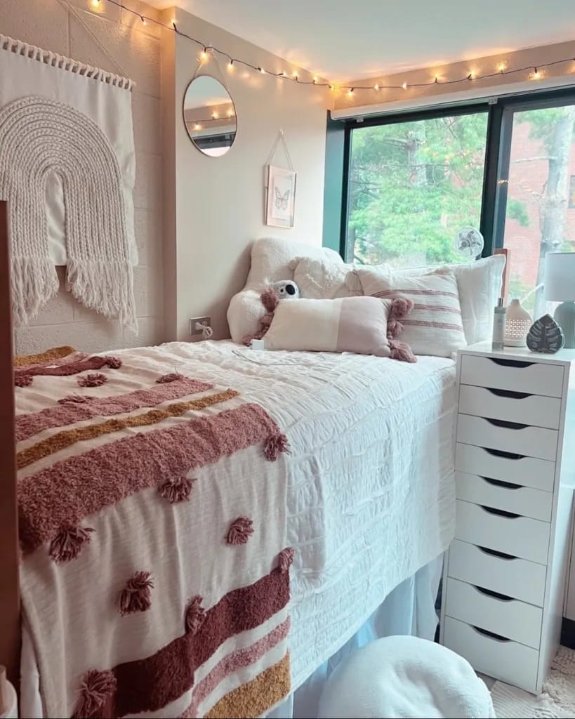 Light-filled dorm room with minimalist decor and soft lighting.