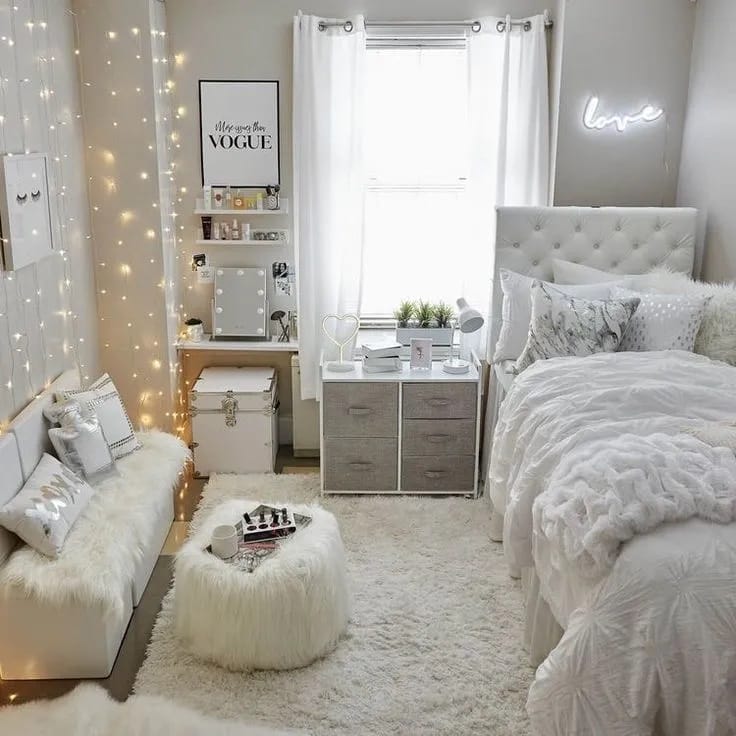 An organized and stylish bedroom with neutral tones and clever storage solutions.