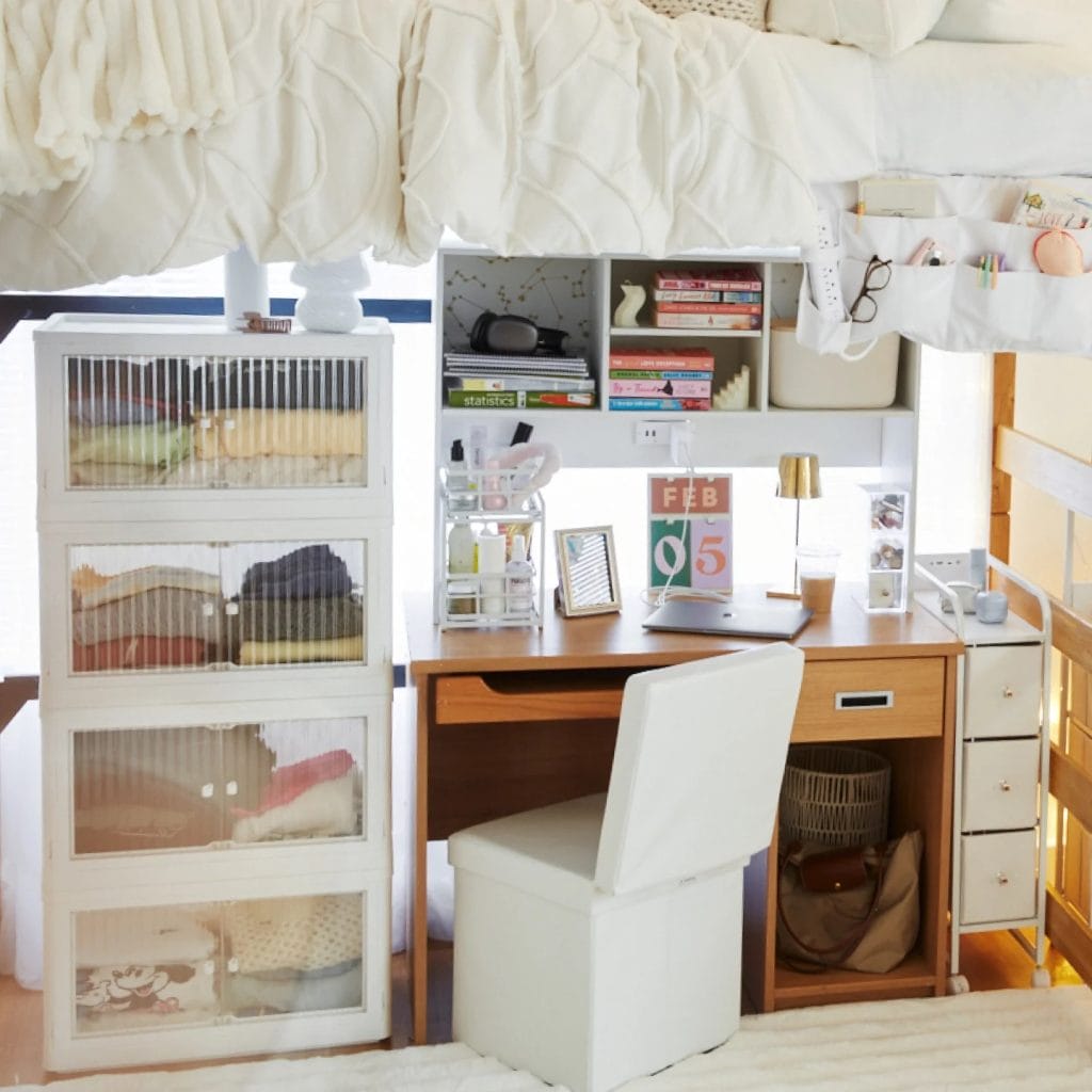 Lofted bed with storage underneath and a neatly organized desk.