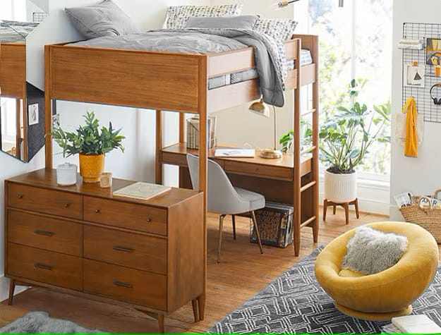 A teen bedroom with a wooden loft bed, desk, and bright natural lighting.