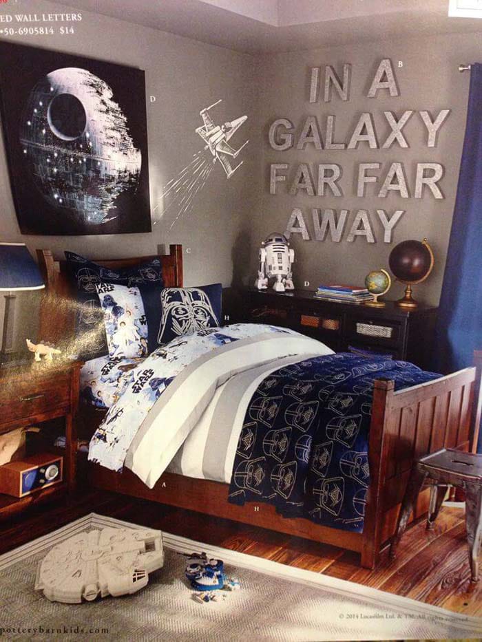 Star Wars-themed bedroom with galaxy decor and bedding.